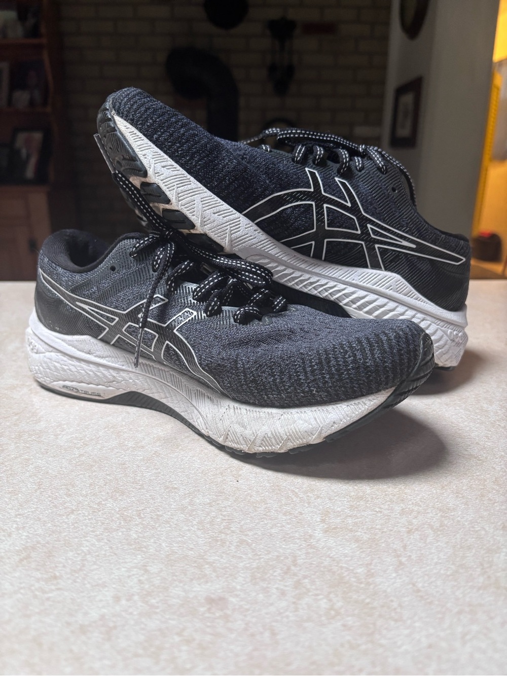 Women’s size 7 wide ASICS GT-2000 10 running shoes.